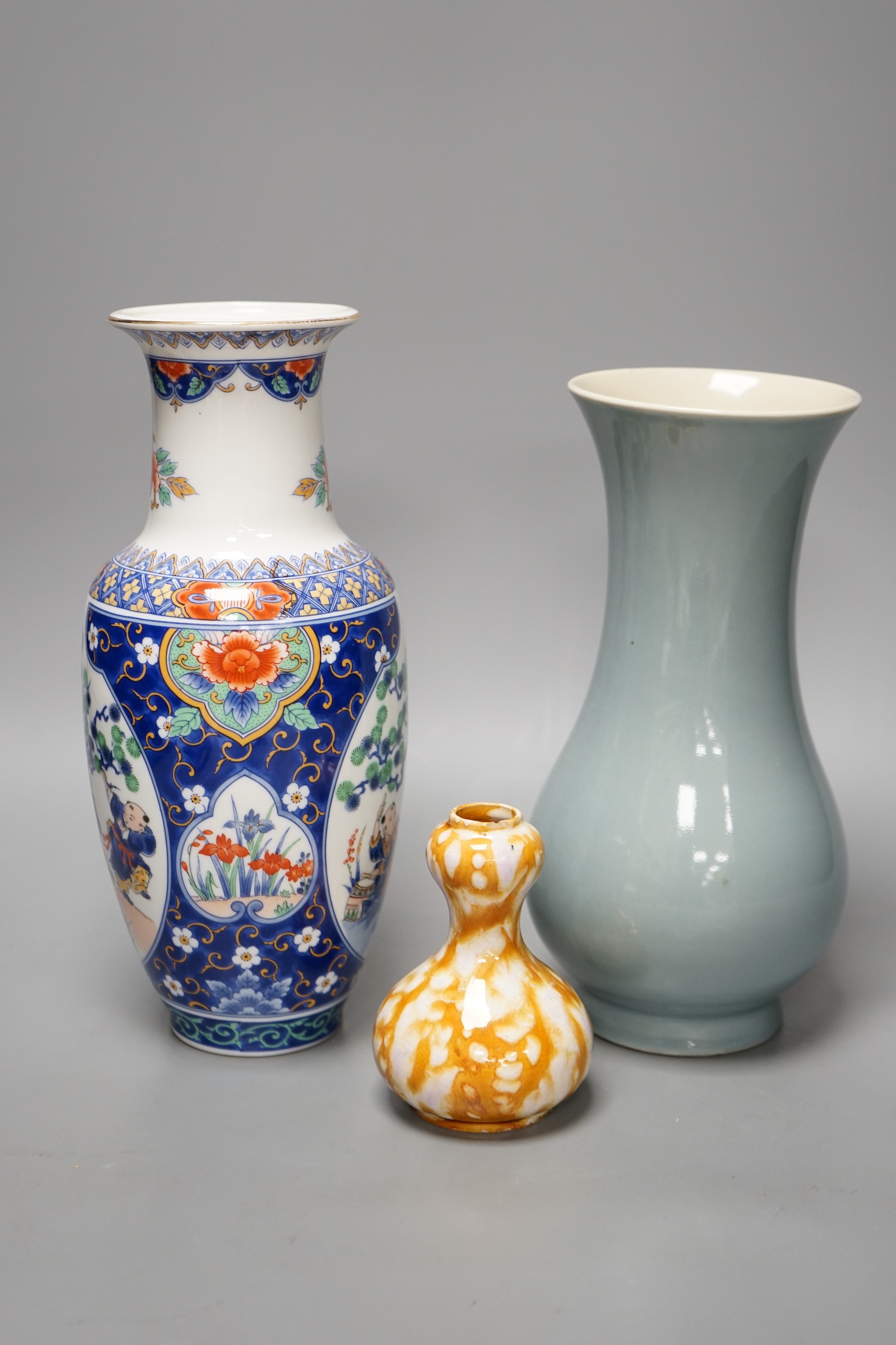 A Chinese Clair De Lune glazed baluster vase and two other Chinese vases. Tallest 26.5cm